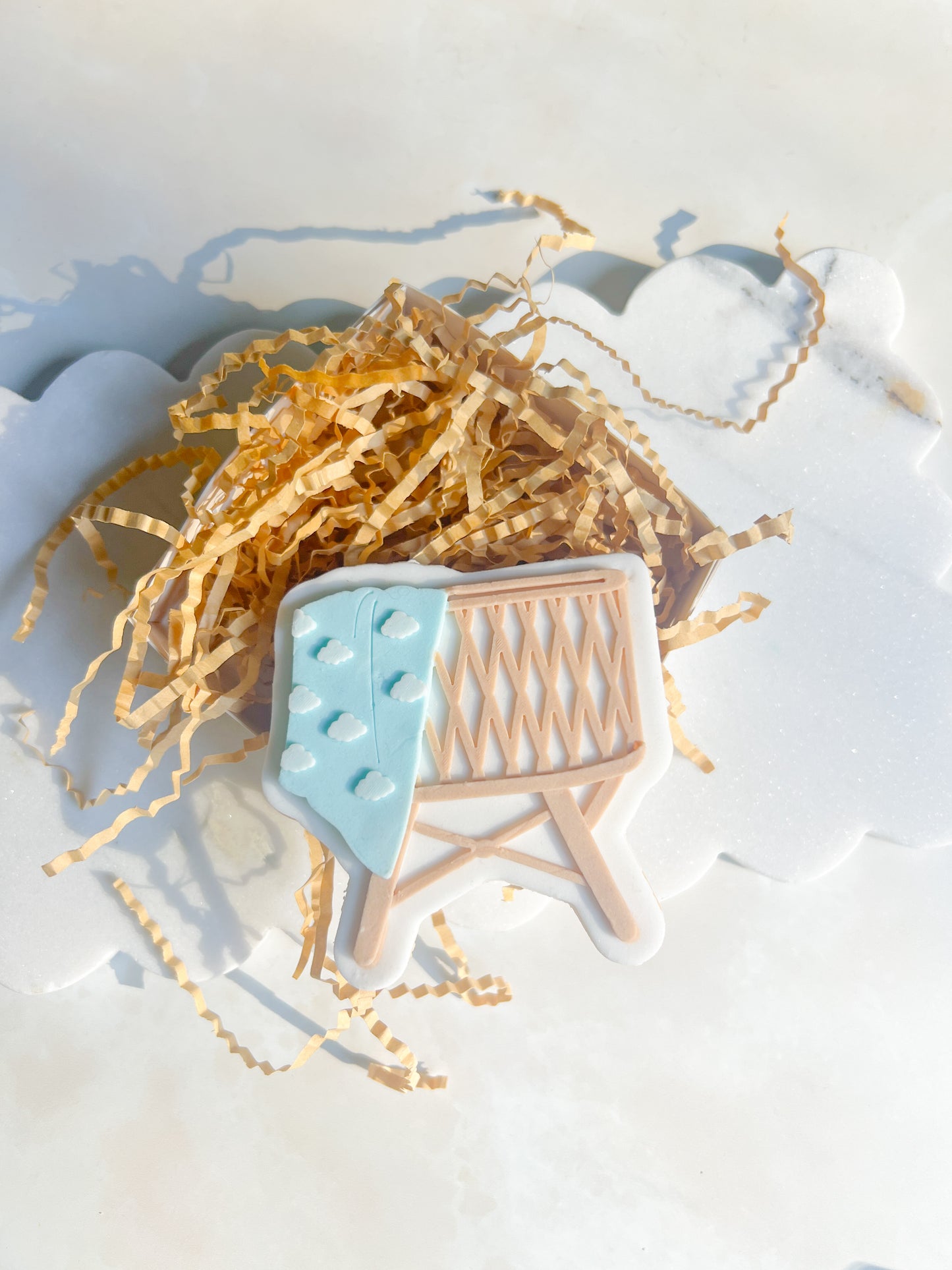 Cot with cloud blanket stamp and cutter