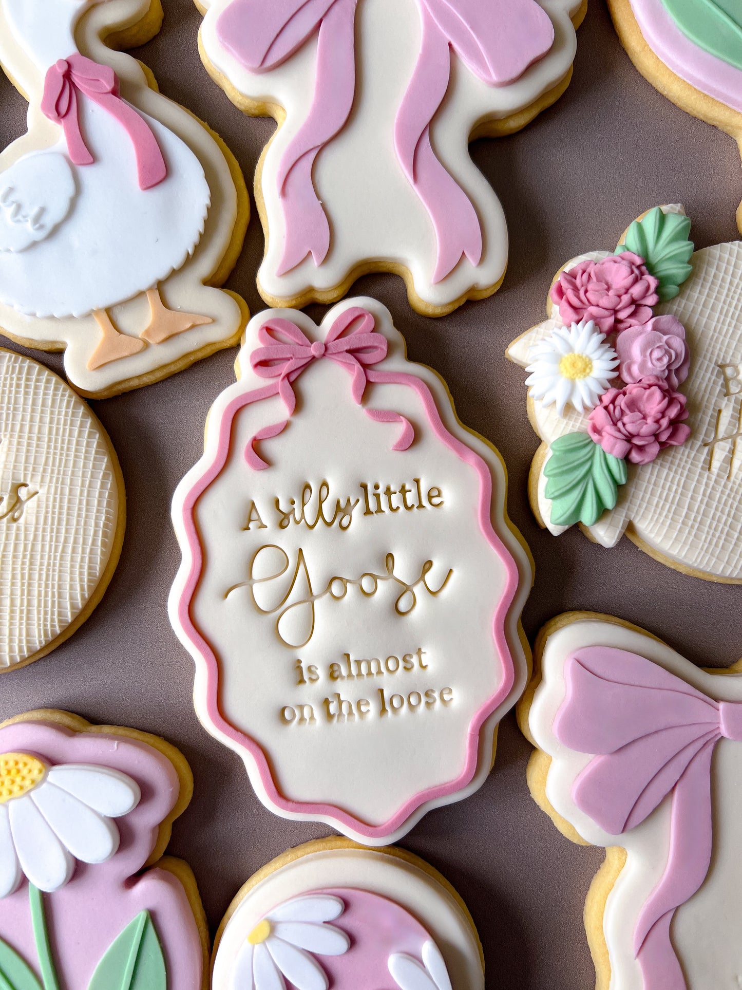 Wavy bow frame stamp and cutter
