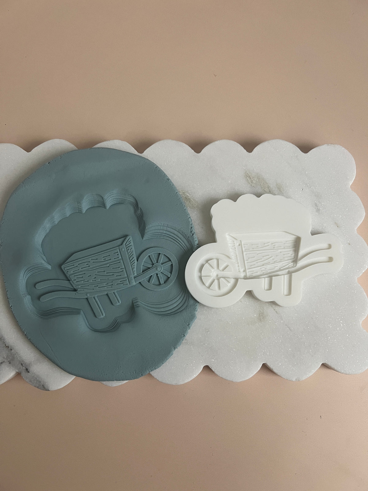 Customisable wheelbarrow debosser and cutter
