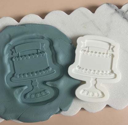 Cake with banner stamp and cutter