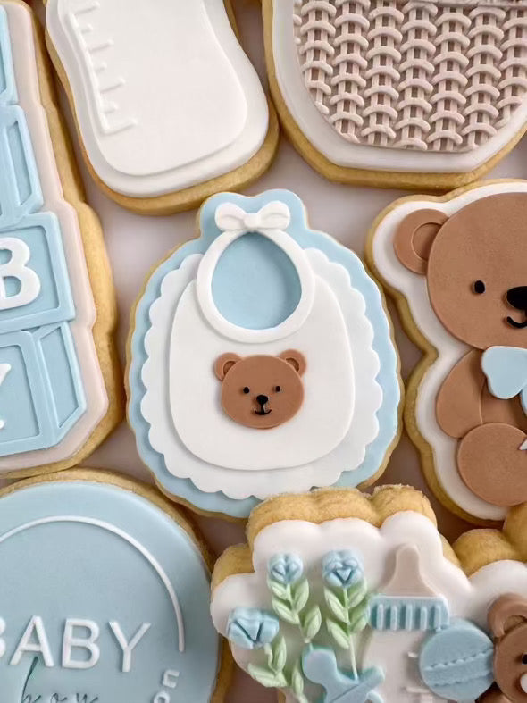 Bear bib debosser and cutter