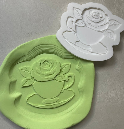 Teacup with rose