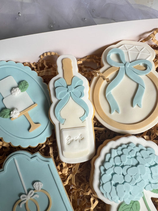 Champagne with bow stamp and cutter