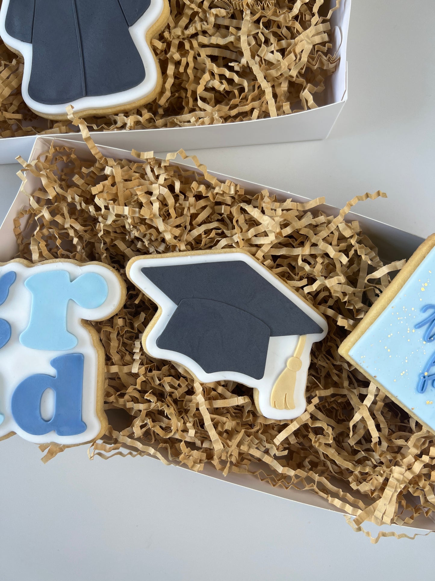 Graduation cap debosser and cutter