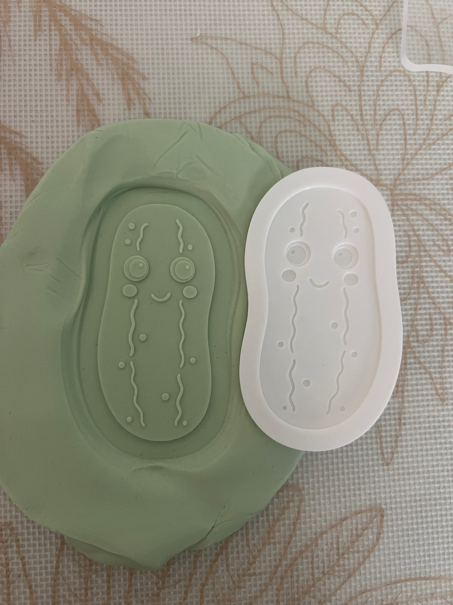 Dill pickle debosser and cutter
