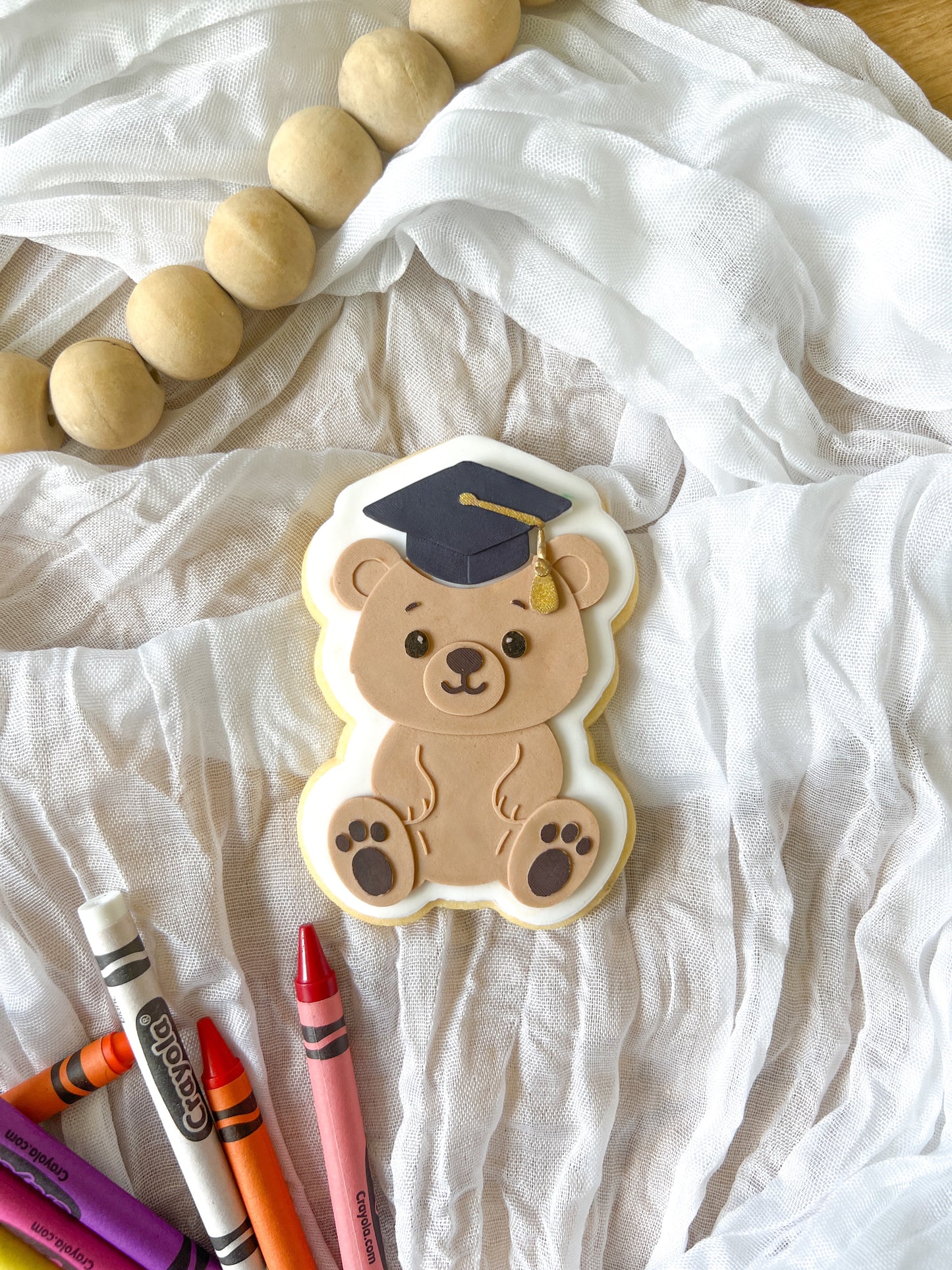 Graduation bear debosser and cutter